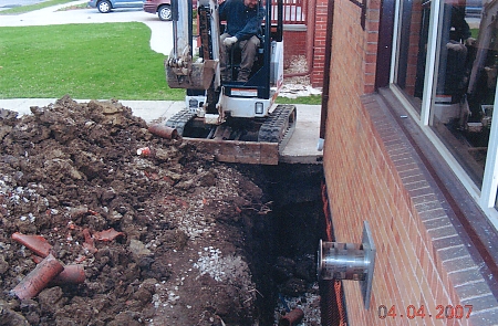 Waterproofed foundation wall